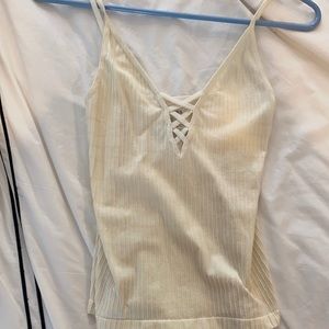 Express rib tight tank top with cross. Size xs